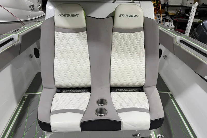 Slide: The Image of Luxury seating in 2017 Statement 350 Open boat with diamond-stitched upholstery. - 32