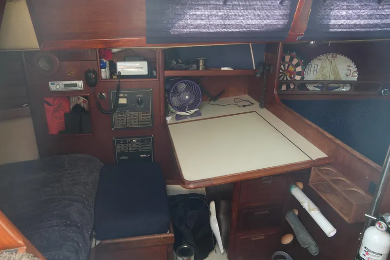 Slide: The Image of Interior of a 1984 Ericson 38 sailboat with navigation station and equipment. - 20