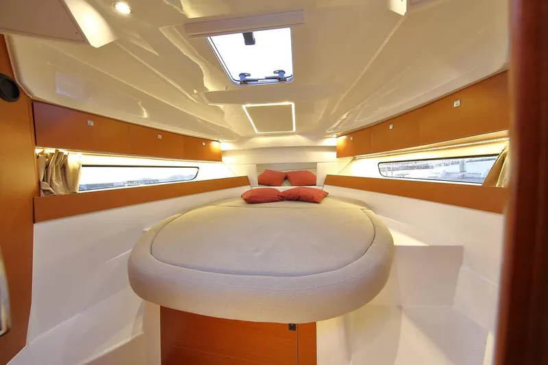Slide: The Image of Luxurious cabin interior of 2020 Jeanneau NC 895 boat with cozy bedding. - 30