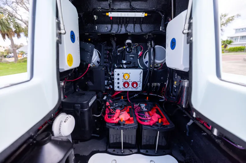 Slide: The Image of 2024 Yellowfin 24 CE boat electrical system with batteries and wiring. - 23