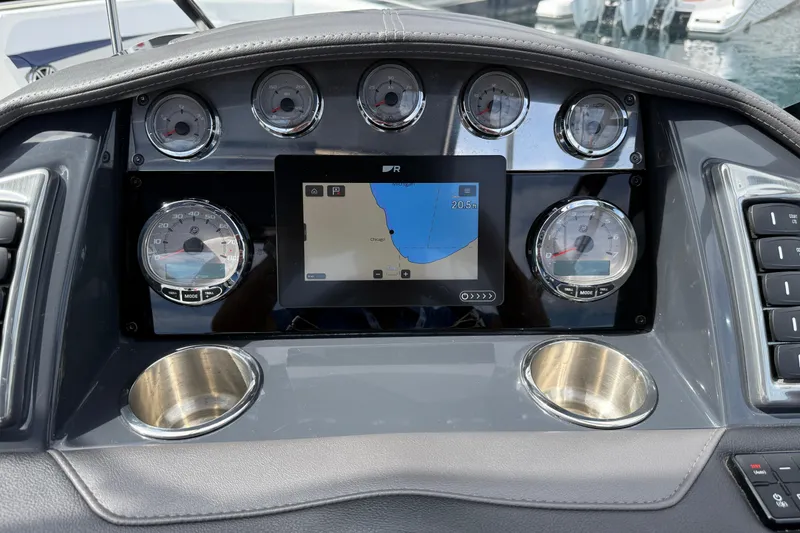Slide: The Image of Dashboard of 2024 Formula 270 Bowrider with navigation screen and gauges. - 12
