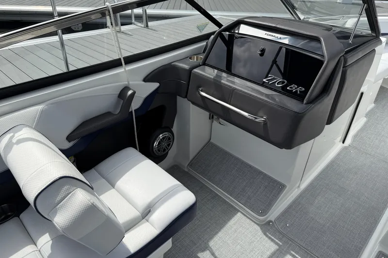 Slide: The Image of 2024 Formula 270 Bowrider interior with sleek seating and modern dashboard design. - 14