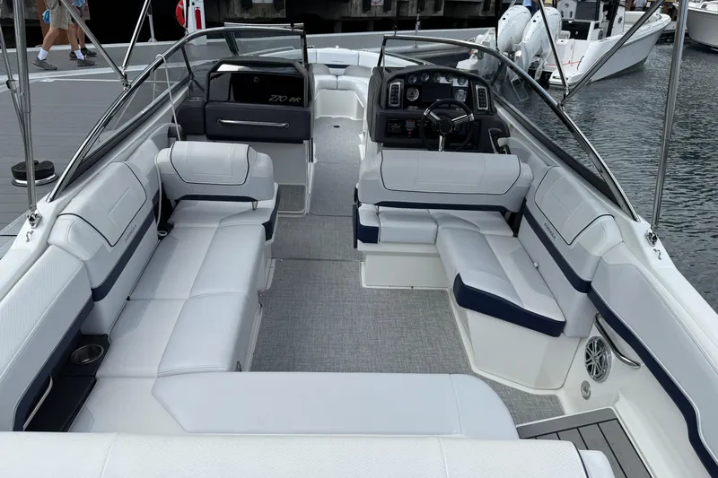 Slide: The Image of 2024 Formula 270 Bowrider interior with spacious seating and modern dashboard design. - 8