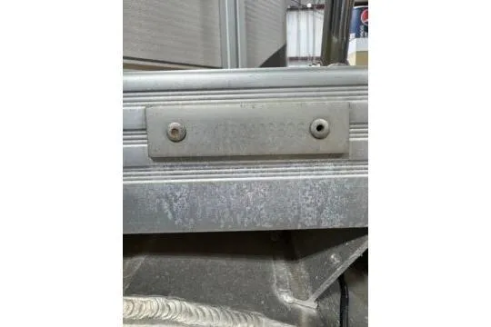 Slide: The Image of 2006 Premier 225 Legend boat identification plate on metallic surface. - 12