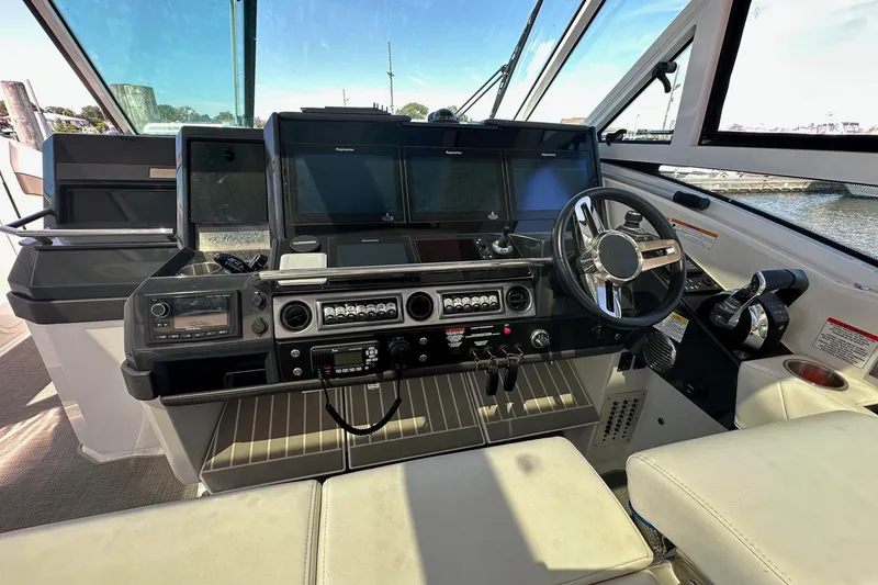 Slide: The Image of 2017 Formula 430 Super Sport Crossover yacht with quad outboard engines on the water. - 10