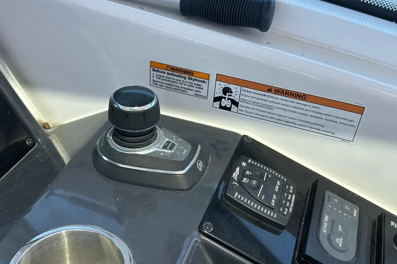 Slide: The Image of 2017 Formula 430 Super Sport Crossover with four outboard motors on open water. - 14