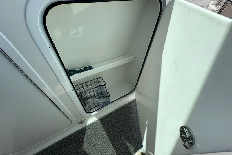 Slide: The Image of 2017 Formula 430 Super Sport Crossover helm with modern navigation displays. - 16