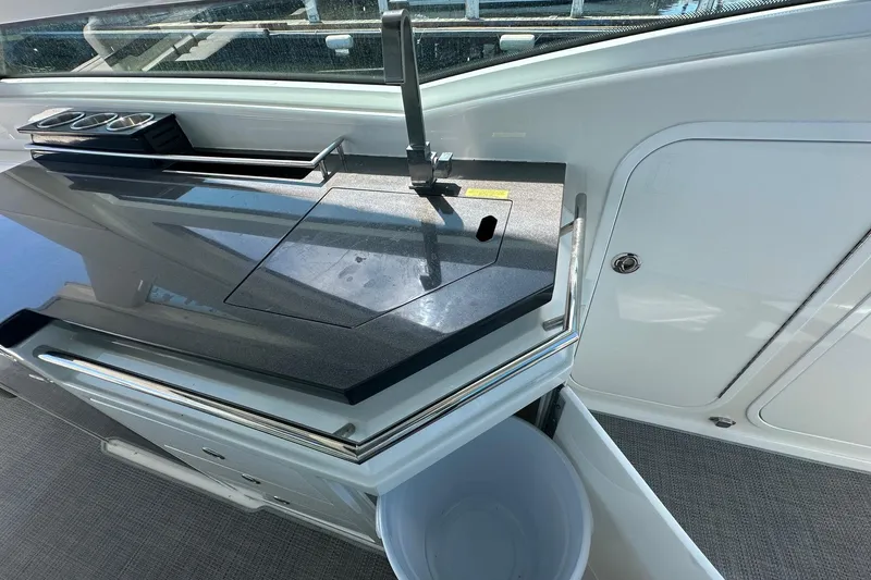 Slide: The Image of Cockpit view of 2017 Formula 430 Super Sport Crossover with advanced navigation displays. - 17