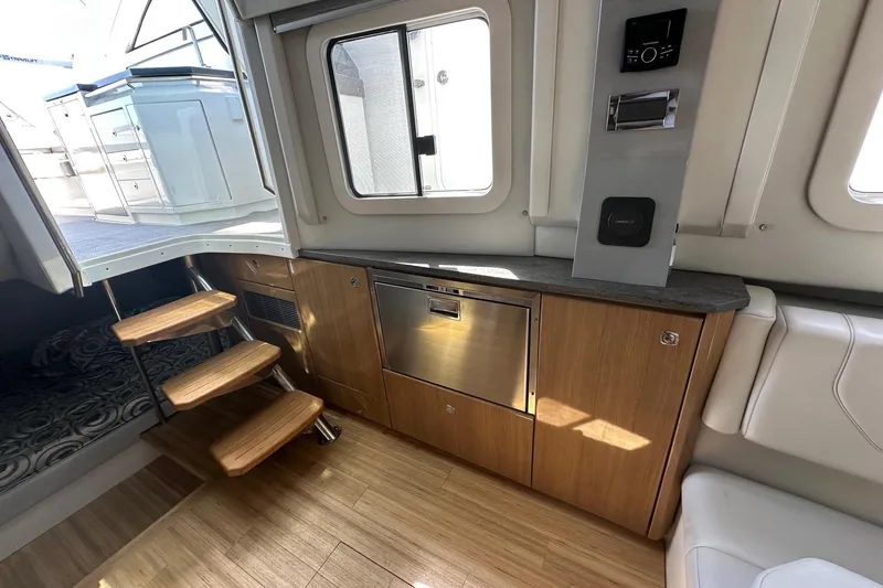 Slide: The Image of Luxurious interior of 2017 Formula 430 Super Sport Crossover yacht on open water. - 26