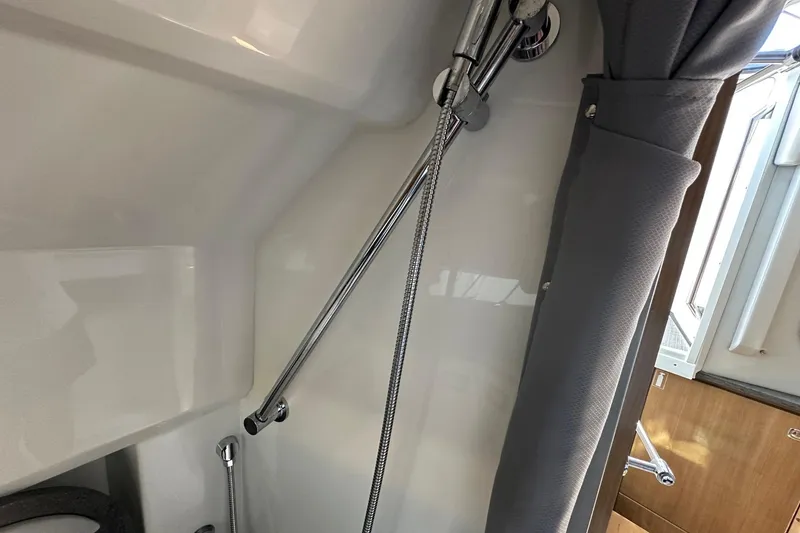 Slide: The Image of 2017 Formula 430 Super Sport Crossover boat with spacious seating at a marina. - 30