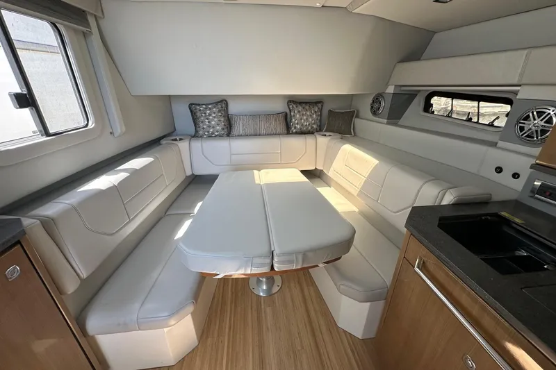 Slide: The Image of Interior of 2017 Formula 430 Super Sport Crossover with modern seating and wooden flooring. - 38