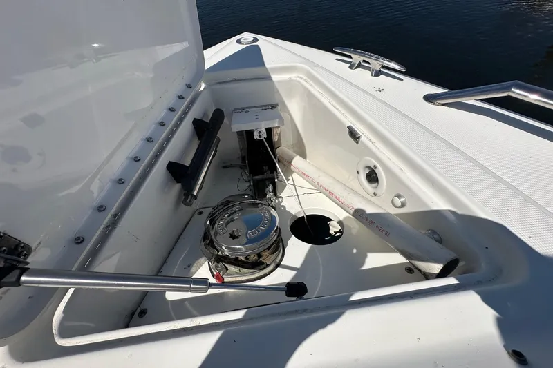 Slide: The Image of 2017 Formula 430 Super Sport Crossover anchor compartment with winch and cleat. - 39