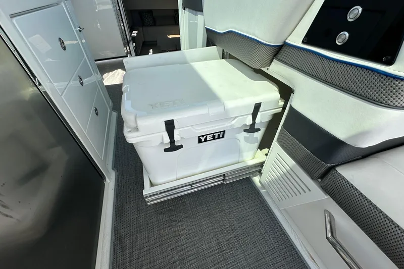 Slide: The Image of YETI cooler inside 2017 Formula 430 Super Sport Crossover boat interior. - 47