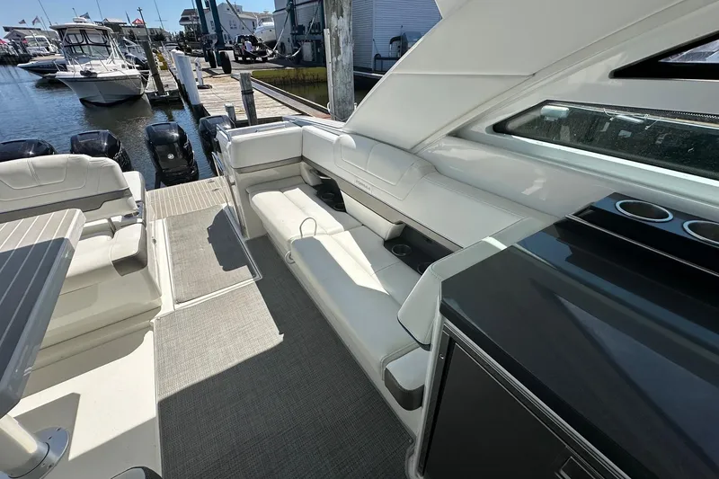 Slide: The Image of 2017 Formula 430 Super Sport Crossover boat on open water, front view. - 9