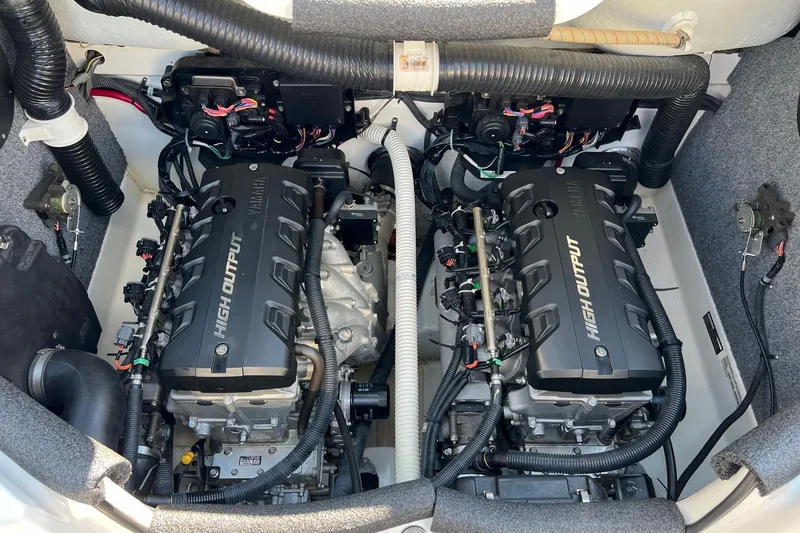 Slide: The Image of 2011 Yamaha Boats AR240 HO engine compartment with dual high-output engines. - 17
