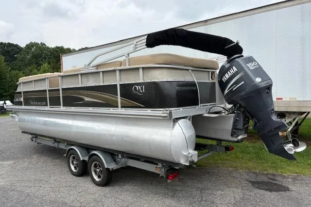Slide: The Image of 2008 Bennington 2275QXi pontoon boat with Yamaha 150 engine on trailer. - 2