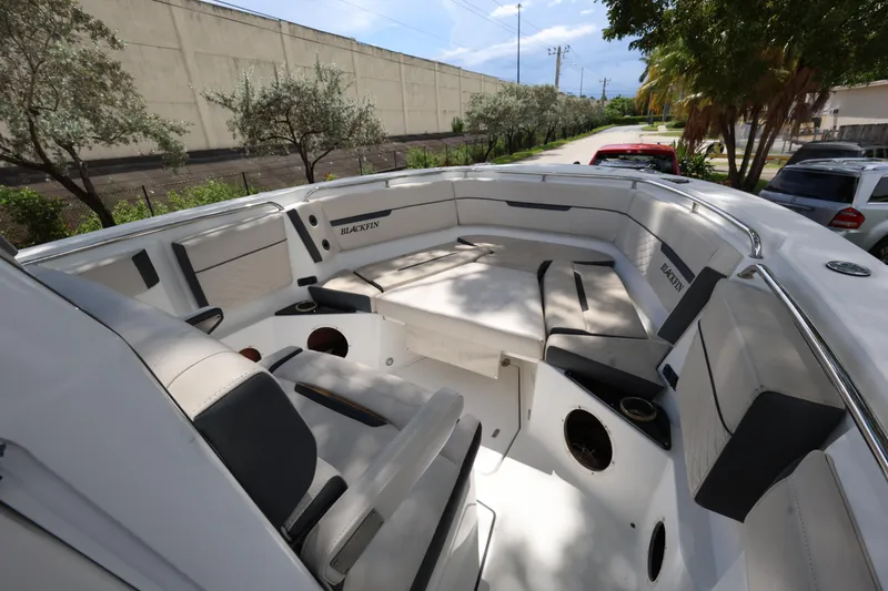 Slide: The Image of 2021 Blackfin 272 CC boat interior with spacious seating and modern design. - 12