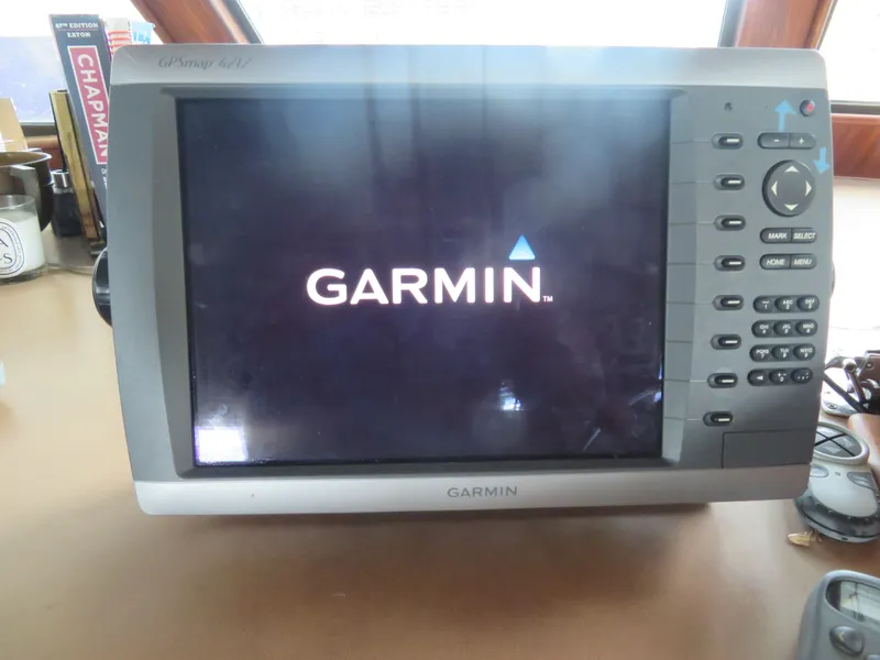 Slide: The Image of Garmin GPSmap 4212 on 1986 Hatteras 58 Motor Yacht dashboard. - 47