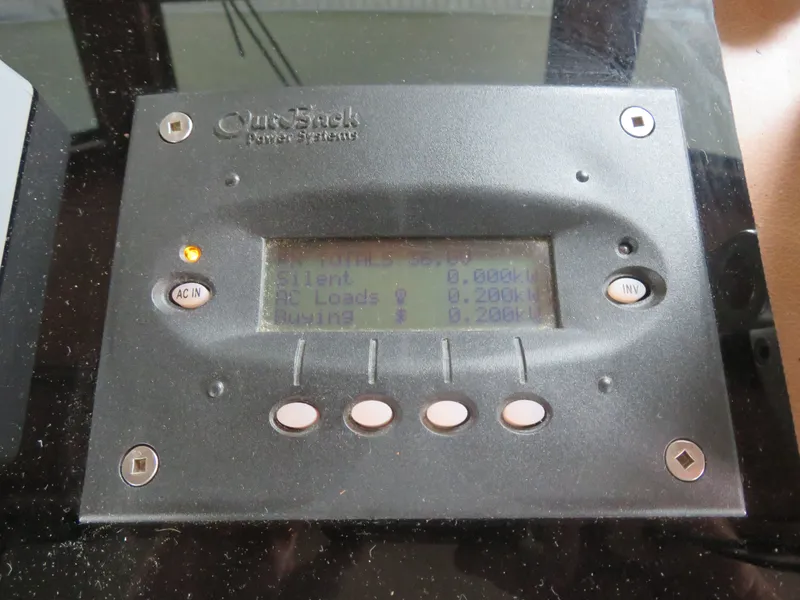 Slide: The Image of OutBack Power Systems display on 1986 Hatteras 58 Motor Yacht. - 48