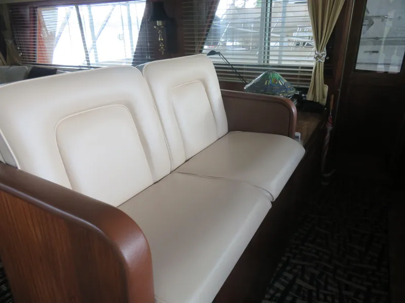 Slide: The Image of Interior of 1986 Hatteras 58 Motor Yacht with cream leather seating. - 7