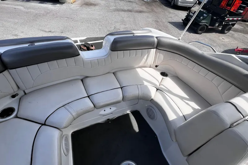 Slide: The Image of 2007 Yamaha Boats AR230 HO interior seating with gray and white upholstery. - 6