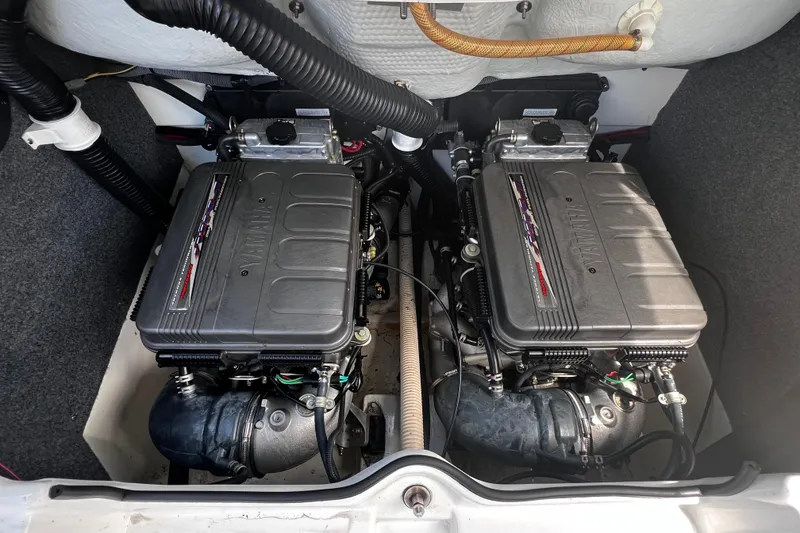 Slide: The Image of Twin engines of a 2007 Yamaha Boats AR230 HO, showcasing detailed components. - 9