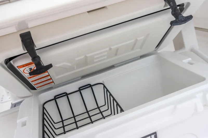 Slide: The Image of Open YETI cooler on 2023 Robalo R250 Center Console boat. - 43