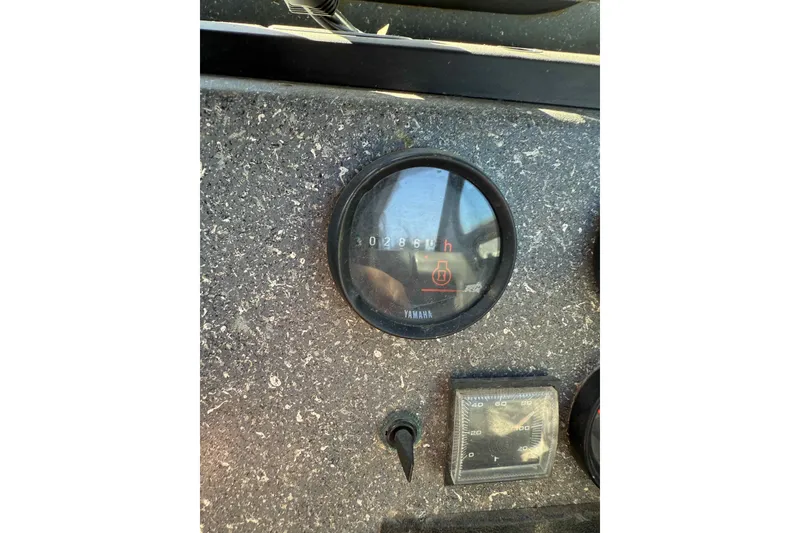 Slide: The Image of Dashboard of a 1991 Fish Rite 22 Custom boat with Yamaha gauge. - 17