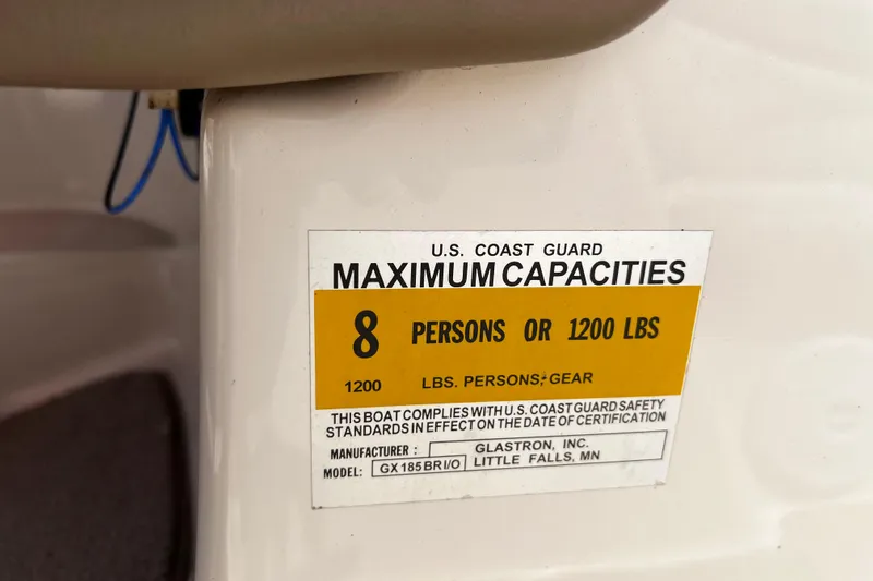 Slide: The Image of 2004 Glastron GX 185 capacity label, U.S. Coast Guard certified for 8 persons or 1200 lbs. - 11