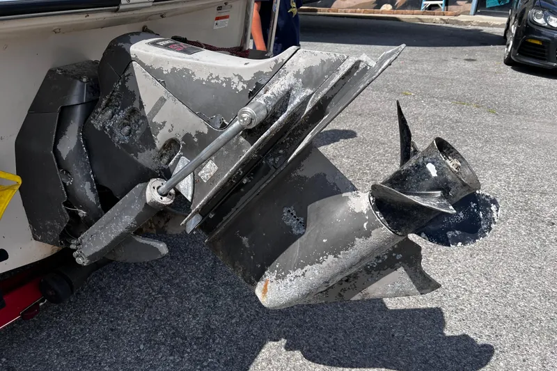 Slide: The Image of 2004 Glastron GX 185 boat propeller with visible wear and corrosion. - 14