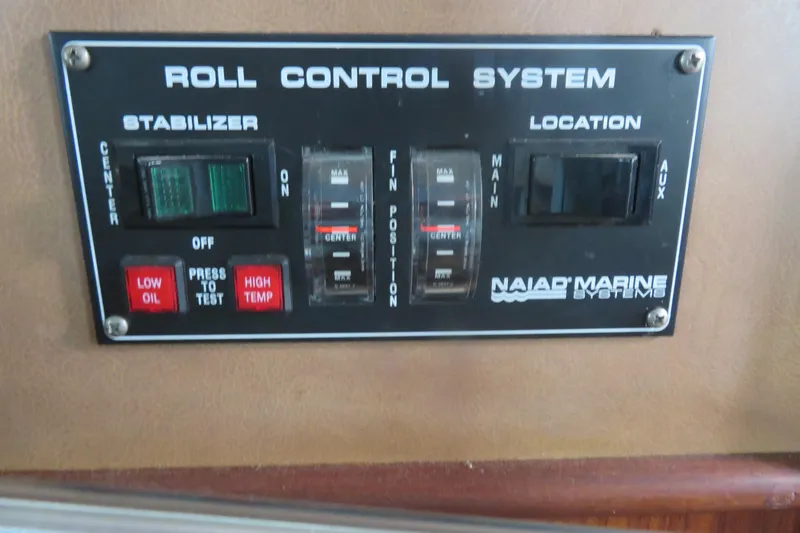 Slide: The Image of Control panel of 1986 Hatteras 58 Motor Yacht's roll control system by Naiad Marine. - 47