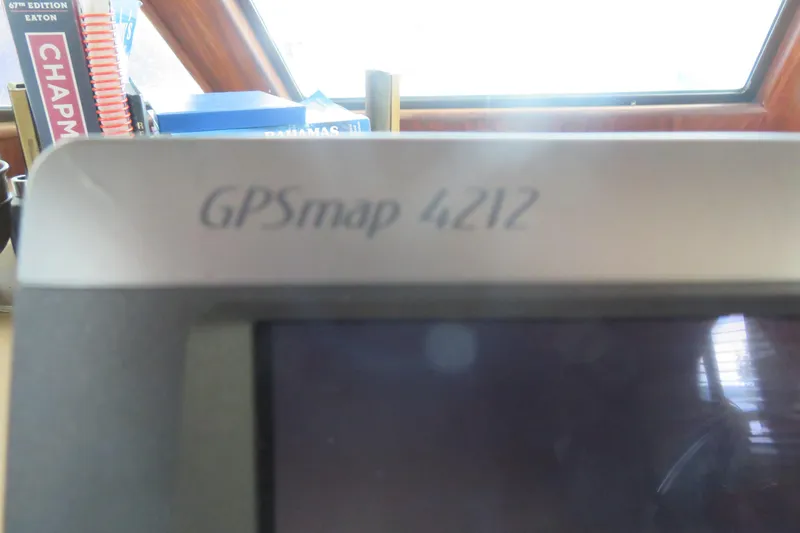 Slide: The Image of GPSmap 4212 device on 1986 Hatteras 58 Motor Yacht dashboard. - 62