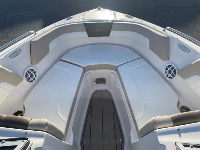 Slide: The Image of 2022 Chaparral 23 SSi boat interior with spacious seating and modern design. - 4