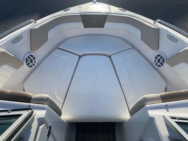 Slide: The Image of 2022 Chaparral 23 SSi boat interior with spacious seating and modern design. - 5