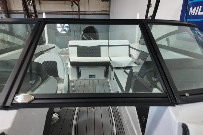 Slide: The Image of 2024 Monterey M-225 boat interior with sleek seating and modern design. - 21