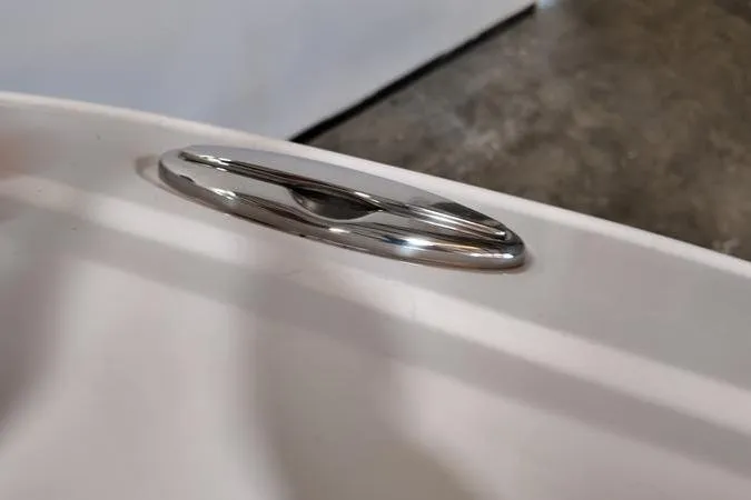 Slide: The Image of 2024 Monterey M-225 boat cleat on white surface, close-up view. - 23