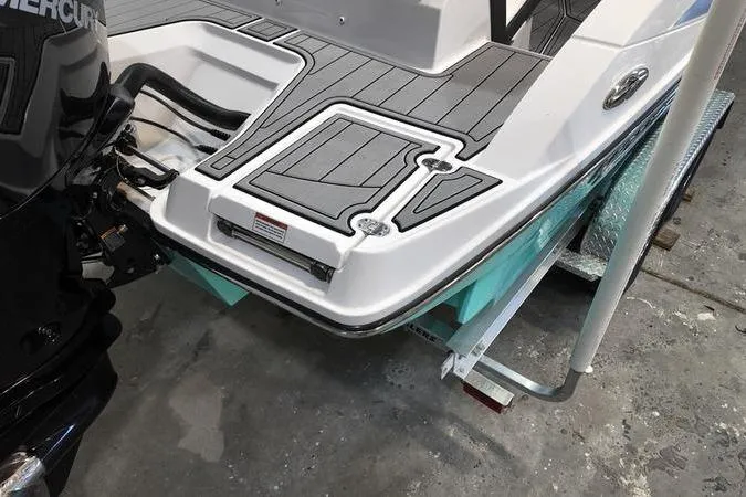 Slide: The Image of 2024 Monterey M-225 boat stern with sleek design and modern detailing. - 6