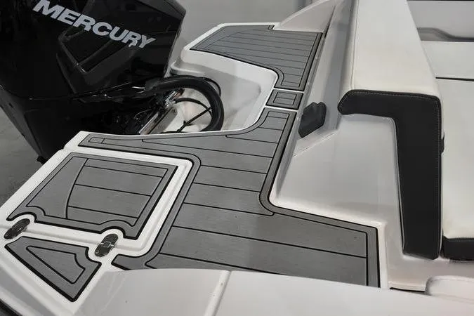 Slide: The Image of 2024 Monterey M-225 boat deck with Mercury engine, featuring sleek design and modern detailing. - 7