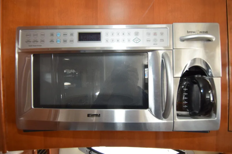 Slide: The Image of Built-in microwave and coffee maker in 2008 Carver 36 Mariner yacht kitchen. - 16