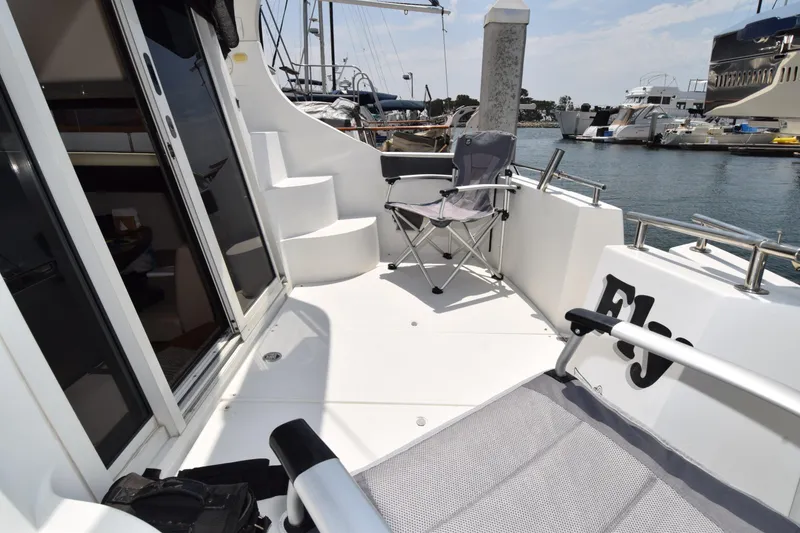 Slide: The Image of 2008 Carver 36 Mariner yacht deck with seating, docked at marina. - 25