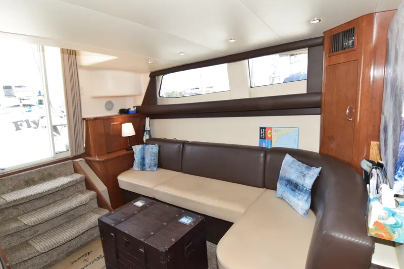 Slide: The Image of Luxurious interior of 2008 Carver 36 Mariner yacht with plush seating and elegant decor. - 5