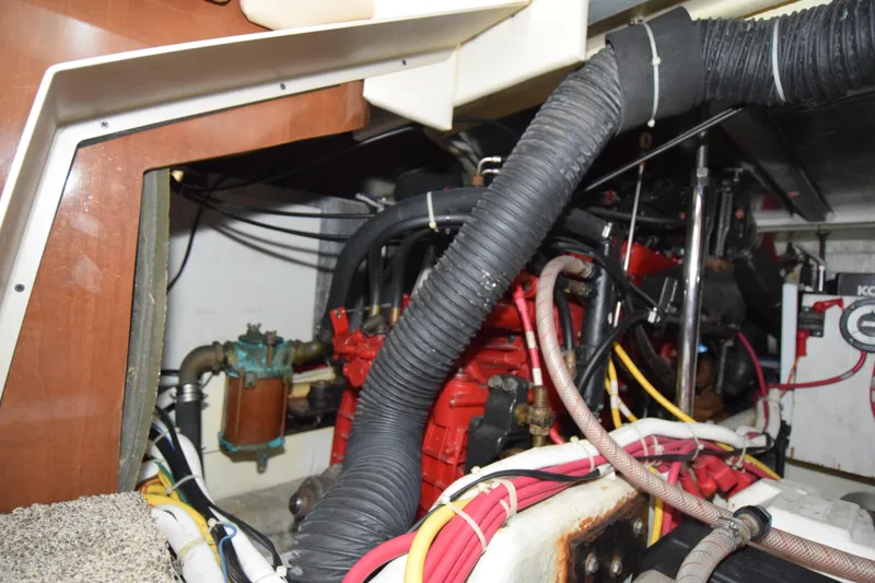 Slide: The Image of Engine room of 2008 Carver 36 Mariner with visible wiring and components. - 11