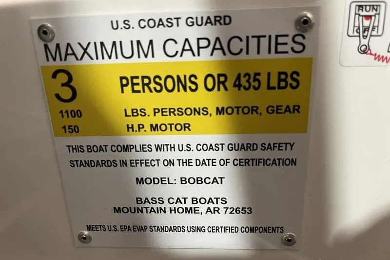 Slide: The Image of 2022 Bass Cat Bobcat boat capacity label, U.S. Coast Guard compliant, 3 persons or 435 lbs. - 17