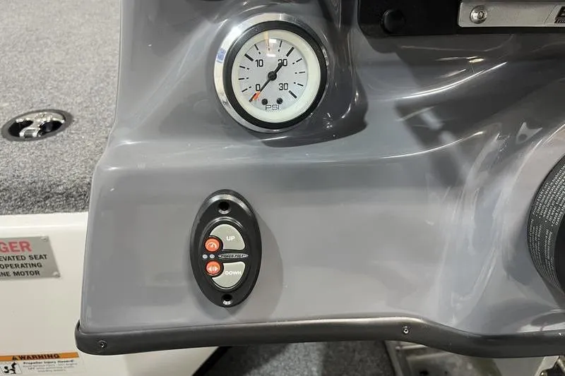 Slide: The Image of 2022 Bass Cat Bobcat dashboard with PSI gauge and control buttons. - 9