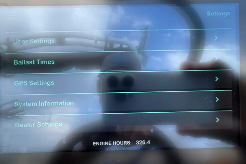 Slide: The Image of Touchscreen display of a 2021 Supreme ZS232 boat showing settings menu options. - 35