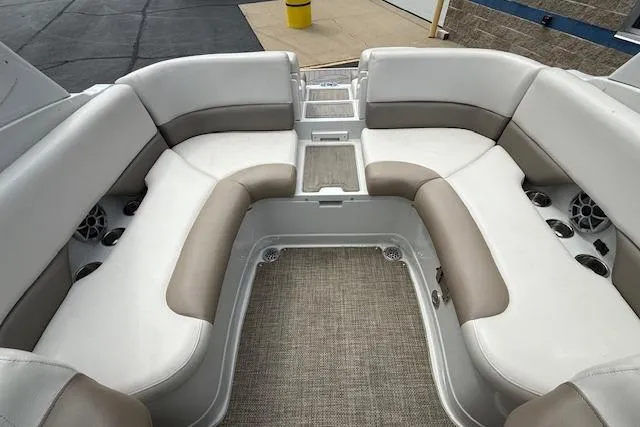 Slide: The Image of 2018 Crownline 255 SS boat interior with spacious seating and modern design. - 18