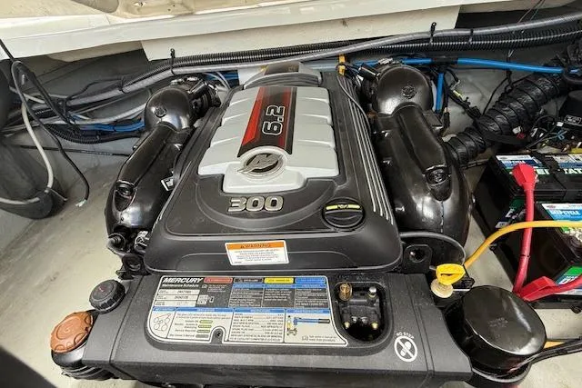 Slide: The Image of 2018 Crownline 255 SS boat engine compartment with Mercury 6.2L 300 HP engine. - 22