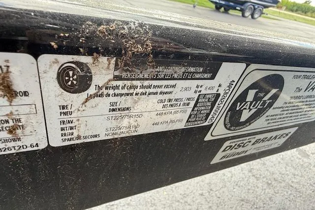 Slide: The Image of 2018 Crownline 255 SS trailer label with tire and cargo specifications. - 43