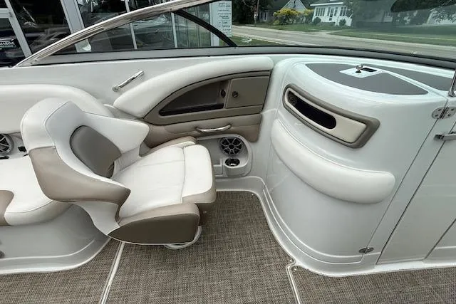 Slide: The Image of Interior of 2018 Crownline 255 SS boat with beige and white seating. - 6