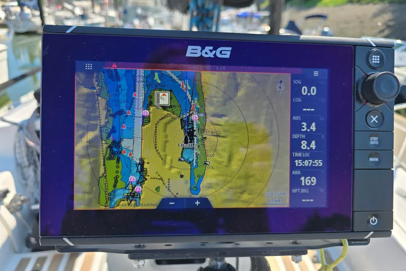 Slide: The Image of B&G navigation system on a 1991 Beneteau 35.5 S5 sailboat, displaying nautical charts. - 18